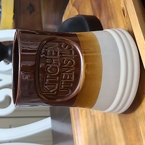 Vintage kitchen utensils holder.